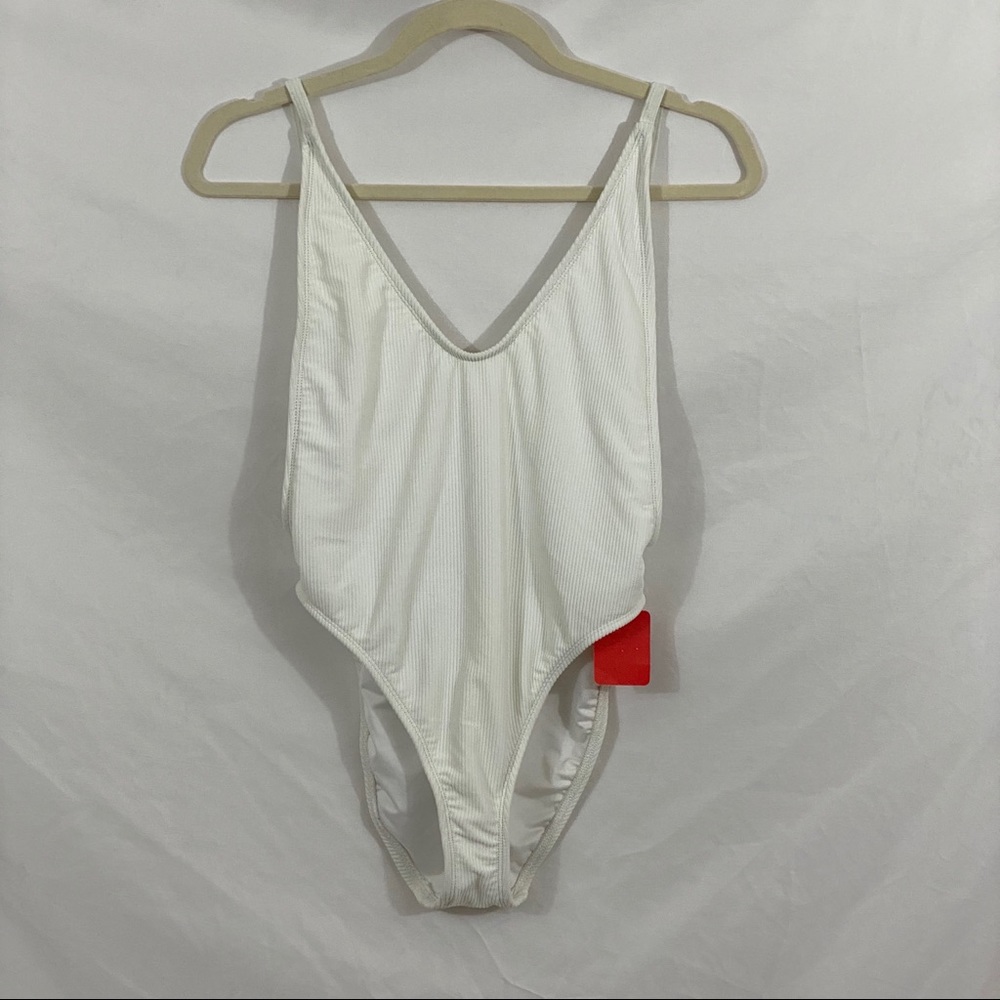 Nasty Gal White Cheeky Swim Suit Size Medium. Fits like a Small or Extra Small.